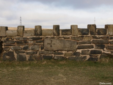 Cross stone wall