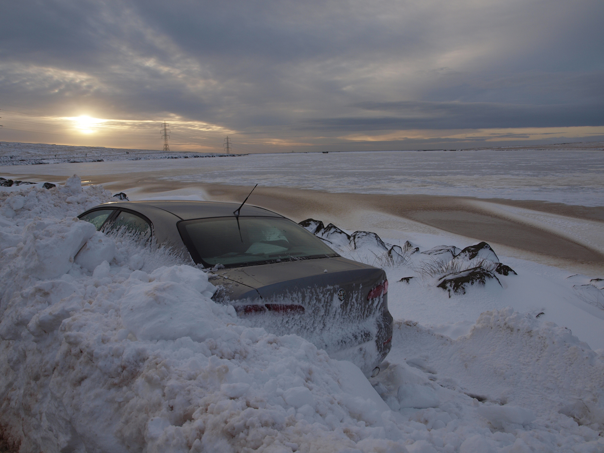 car in snow drift blackstone edge